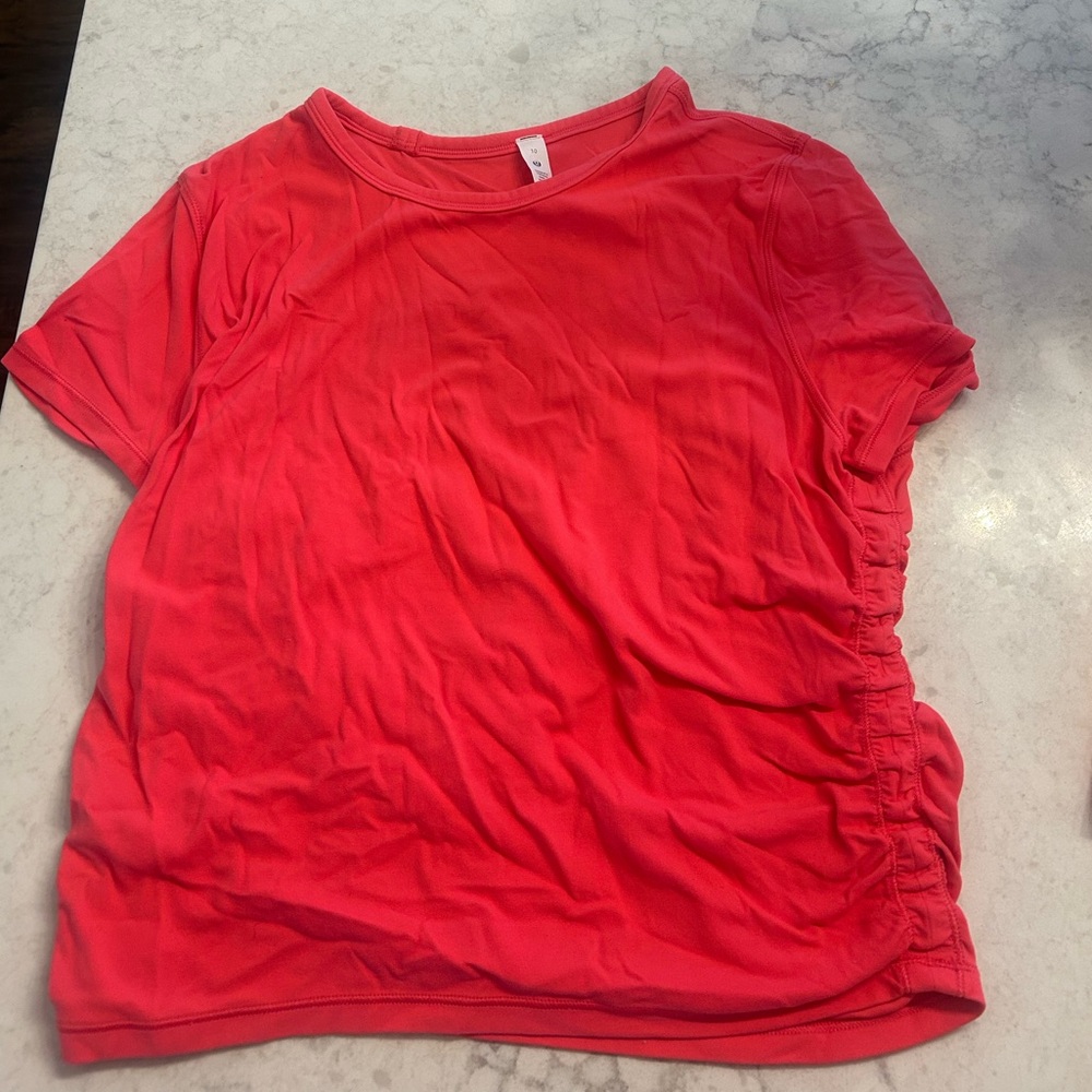 Luluemon All it takes nulu short sleeve fitted shirt. Size 10.